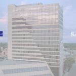 A large building with a sky background